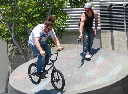 We’re all capturing the moment, becoming part of the Documented Life. Recording bike stunts outside the L.A. Convention Center during Adobe Max. (Source: JPR)