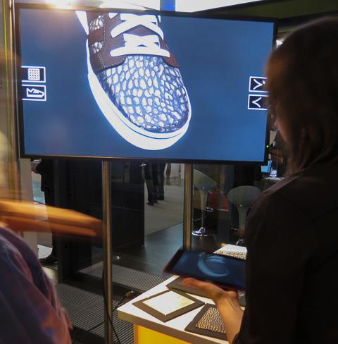 A silvery blue tennis shoe might not be for everybody, but RTT demonstrated the ability to design a tennis shoe and see how different materials looked using an iPad in a remote configuration. Then, well, maybe if you wanted to buy it, why not? (Source: JPR)