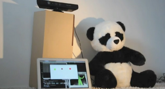 Cute Little Beggar: The robotic panda moves its head and arms based on 3D sensor data (Kinect, in this case) of passing humans. (Source: Delicode)