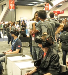 Adrift in the Rift, attendees at the Game Developer Conference try out the Oculus Rift. 