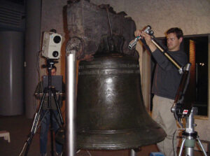 Jeff Mechlinski (behind the computer) and Sean Frank (holding the scanner arm) from Direct Dimensions scan the Liberty Bell in Philadelphia. (Source: Direct Dimensions)