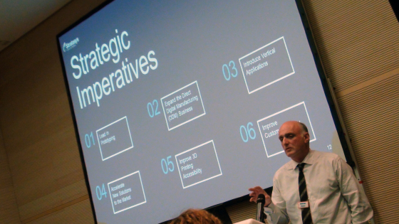 Stratasys CEO David Reis explains the six pillars of Stratasys strategy. (Photo by Tom Lansford)