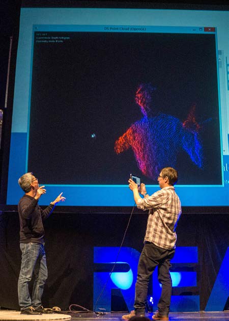 Mark Yahiro (left) shows off real time capture with a RealSense tablet.