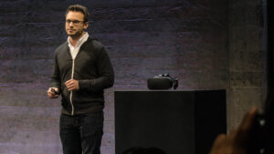 Oculus CEO Brendan Iribe walks the audience of press, analysts, and developers through Oculus' news. (Source: JPR) 