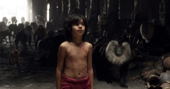Mowgli standing among the animals. (Source: Disney Enterprises, Inc. All Rights Reserved.)