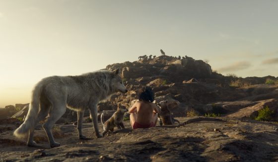 Visual effects using Animatrik showing Mowgli with the wolves. (Source: Disney Enterprises, Inc. All Rights Reserved.) 