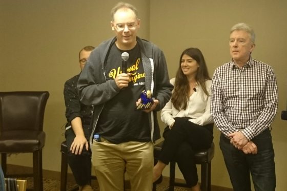 Epic Games founder and CEO Tim Sweeney, left, accepted the Jon Peddie Research Technology Advancement Award from Dr. Jon Peddie during the JPR Siggraph Press Luncheon. In accepting the award, Sweeney said the day will soon arrive when we all use augmented reality glasses, running the equivalent of game engine technology, to engage the world. (Source: JPR)